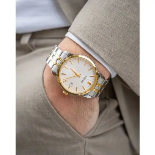 שעון יד SEIKO לגבר בשילוב כסף וזהב צהוב דגם SUR402P1 על יד